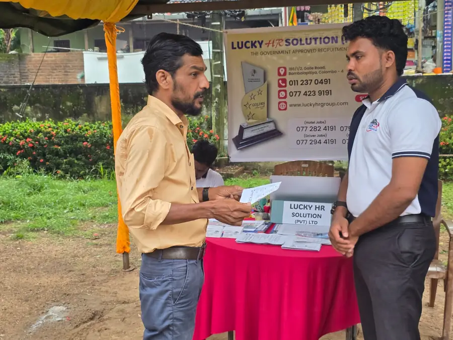 Lucky HR officer speaking with a candidate in Sammanthurai